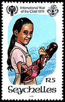 Seychelles: Girl plays with puppet | Puppet Stamp